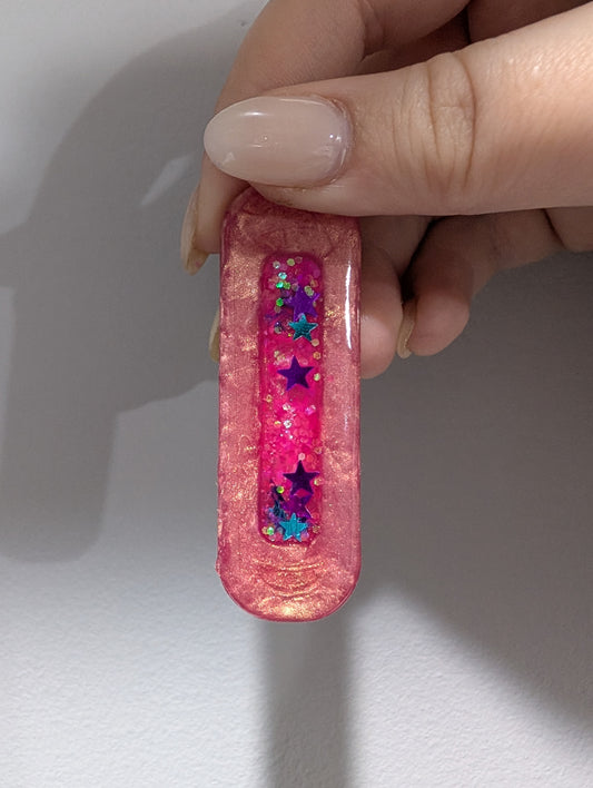 Pink Shaker Hair Clip with Blue and Purple Stars